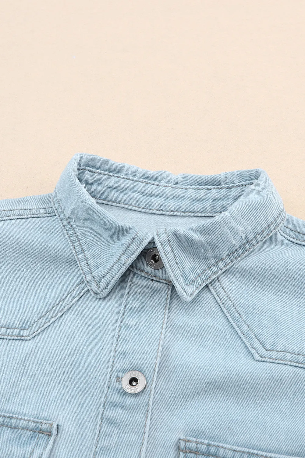 Wholesale Light Blue Flap Pocket Buttoned Raw Hem Denim Shacket